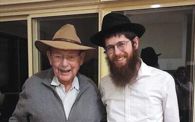 Lennox Head resident Henri Bader (left), 93, with Rabbi Menachem Aron on May 28.