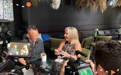 Behind the scenes with Lisa and Danny Goldberg filming the Martinis and Snacks episode.