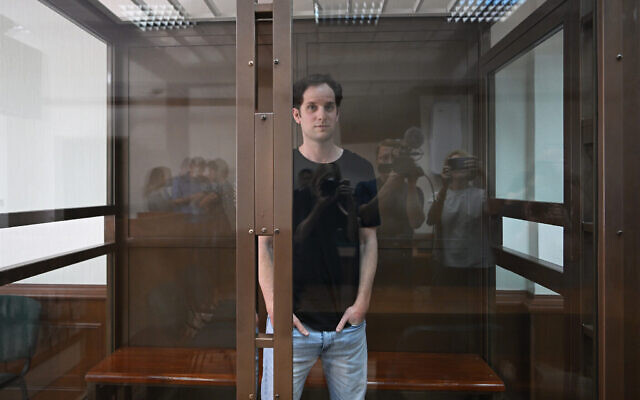 Wall Street Journal reporter Evan Gershkovich stands inside a glass cage before a hearing on his appeal against his extended detention, at the Moscow City Court, in Moscow on June 22, 2023. Photo: Natalia Kolesnikova/AFP