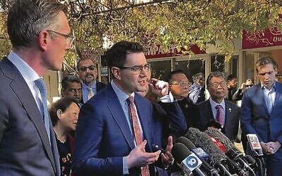 Darren Bark (centre) at a press conference with former premier Dominic Perrottet (left). Photo: Supplied