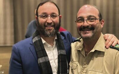 Rabbi Daniel Rabin (left) with South African ranger Sean Rubenstein.