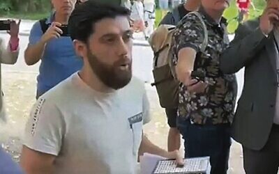 The activist outside the Israeli embassy in Sweden, where he had been granted permission to burn a Torah. Photo: Screen capture
