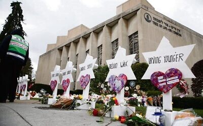 Star of David memorials for Bowers' 11 victims outside the Tree of Life synagogue two days after the mass shooting in 2018. 
Photo: EPA/Jared Wickerham