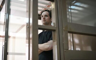 US journalist Evan Gershkovich stands inside a defendants' cage at Moscow City Court on June 22, 2023. Photo: Natalia Kolesnikova/AFP via Getty Images