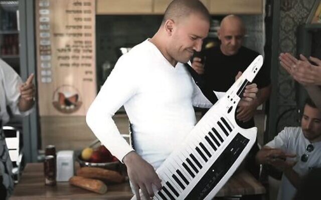 Performers dance in the video for the song Omelette Bread in Netanya. Photo: screenshot from YouTube