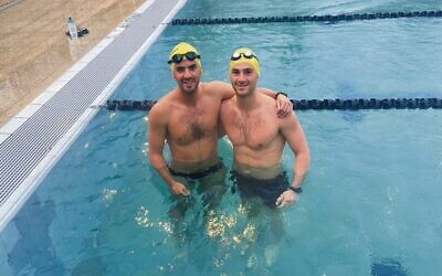 Dylan (left) and Ryan Blumberg after a swimming training session.