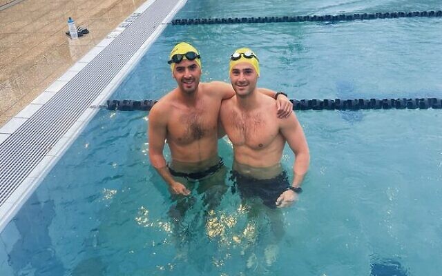 Dylan (left) and Ryan Blumberg after a swimming training session.