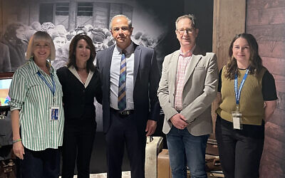 Israeli Ambassador Amir Maimon (centre) with museum chair Jason Steinberg and museum staff. Photo: Supplied