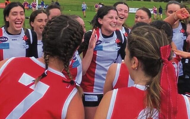 The Jackettes celebrating their preliminary final win last Saturday at Elsternwick Park.