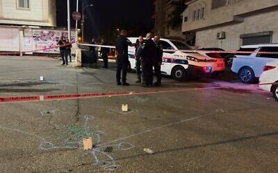 Police at the scene of a shooting in the central Arab city of Tira. 
Photo: Israel Police