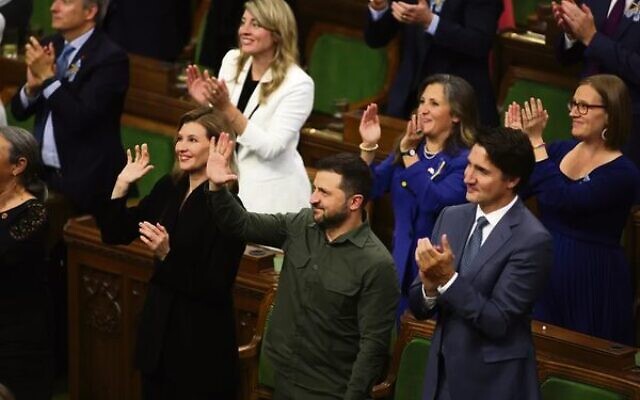 Volodymyr Zelensky and Justin Trudeau join the standing ovation. 
Photo: Patrick Doyle/The Canadian Press via AP