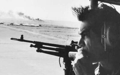IDF chief of staff David Elazar looks over the Suez Canal during the Yom Kippur War, October 1973. Photo: Israeli State Archives