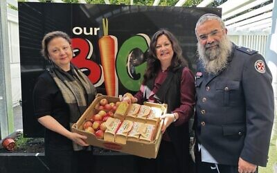 From left: Christine Elder, Laya and Rabbi Dovid Slavin. 
Photo: Noel Kessel