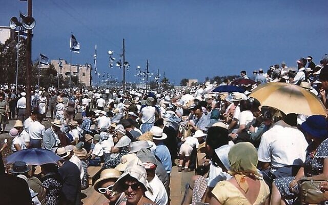 Susie Klein watches the Independence parade in Israel, 1960.