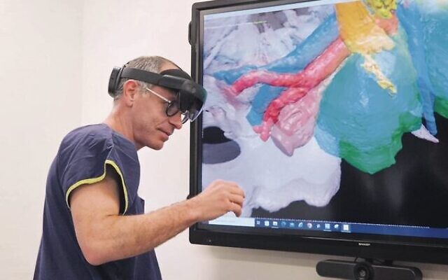 Peter Mac surgeon Associate Professor David Gyorki trials the new technology.