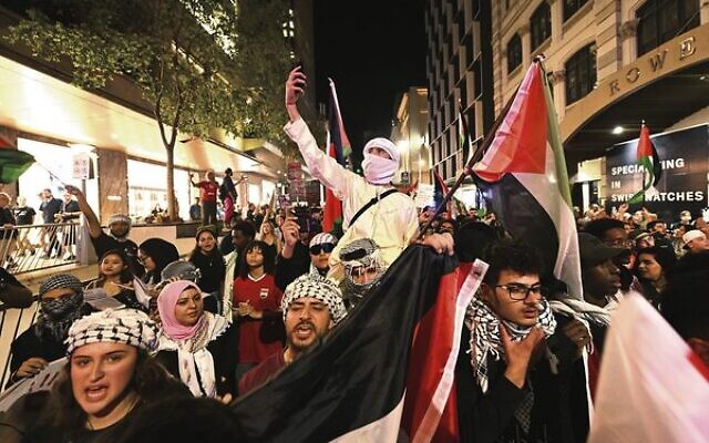 Pro-Palestinian demonstrators in Brisbane last Friday, October 13. 
Photo: AAP Image/Darren England