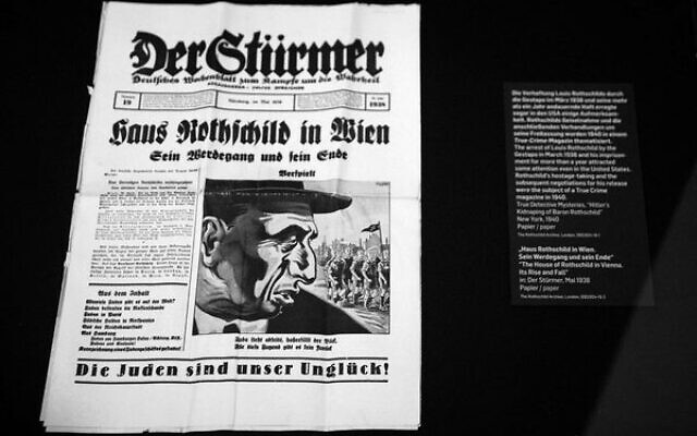 An article with the headline 'The House of Rothschild – Its Rise and Fall' is seen on the front page of the Nazi newspaper Der Stürmer from May 1938 at an exhibition in the Jewish Museum in Vienna in 2022. Photo: Alex Halada/AFP