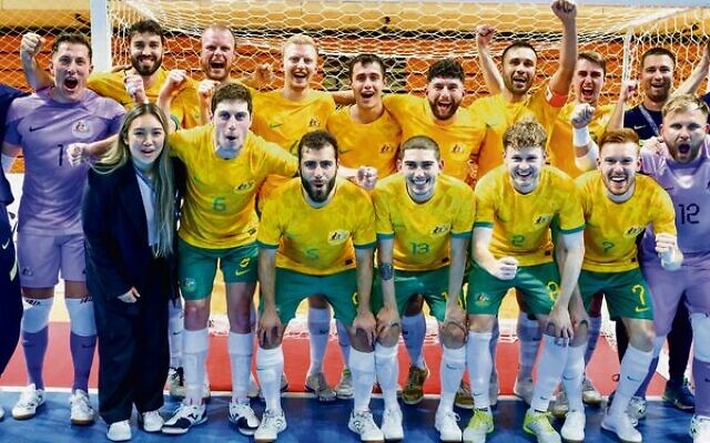 The Futsalroos celebrate in Chinese Taipei. Ethan De Melo is in the back row, fifth from the left. Photo: AFC Media