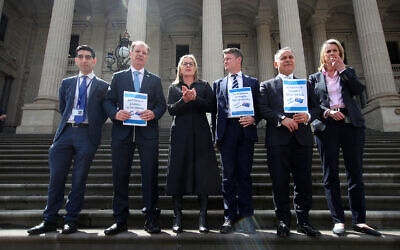 Victorian Premier Jacinta Allen (third from left) addresses a pro-Israel support rally on the steps of Parliament House today, ahead of the adopted condolence motion. 
From left: Box Hill MP and Co-chair of Victorian Parliamentary Friends of Israel, Paul Hamer; Caulfield MP and Deputy Leader of the Opposition David Southwick; Premier Jacinta Allen; Deputy Premier Ben Carroll; Opposition Leader John Pesutto, and Liberal MP Georgie Crozier. Photo: Peter Haskin/The Australian Jewish News.