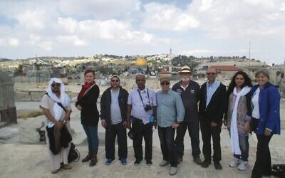 Alex Kats (centre) and Rabbi Ralph Genende (third from right) on an interfaith trip to Israel. Photo: Supplied