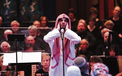 In 2014, Abdul Aziz gives a Muslim call to prayer at Temple Beth Israel's Sacred Music Concert – An Interfaith Celebration. Photo: Peter Haskin