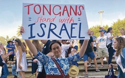 A member of Brisbane's Tongan community expresses support for Israel at the rally.