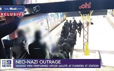 Neo-Nazis at Flinders St Station. Photo: Screenshot/Channel 9 via Daily Mail