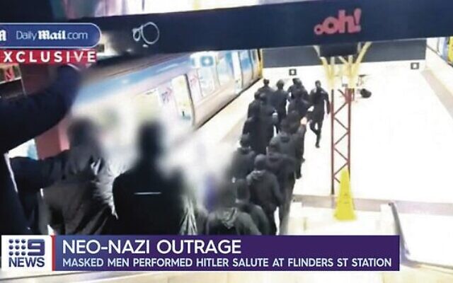 Neo-Nazis at Flinders St Station. Photo: Screenshot/Channel 9 via Daily Mail