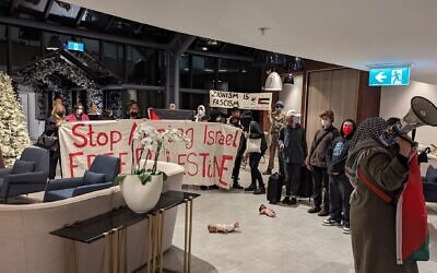 The demonstrators at the hotel in Melbourne.