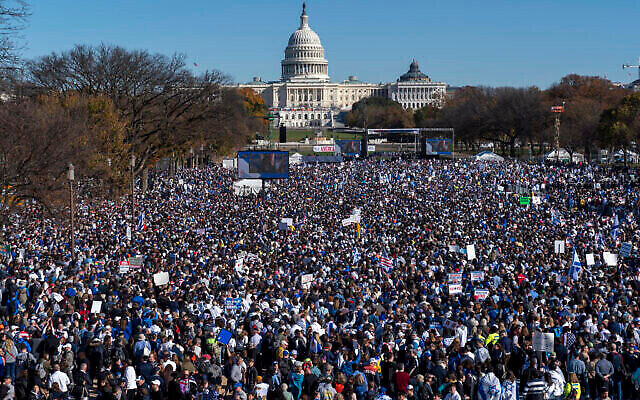 People attend the March for Israel rally November 14, 2023, on the National Mall in Washington. (The Times of Israel: AP Photo/Jacquelyn Martin)