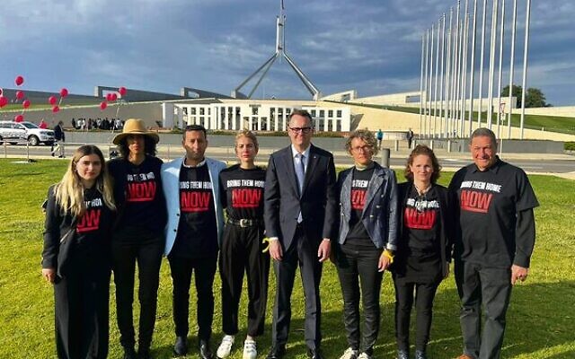 Senator Andrew Bragg (fourth from right) with Israeli-Australian 'United With Israel' volunteers outside Parliament House, Canberra on November 14.