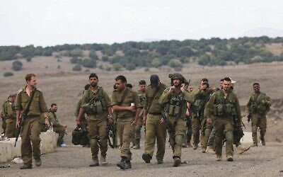 Israeli reserve soldiers in the Golan Heights on October 30. 
Photo: David Cohen/Flash90