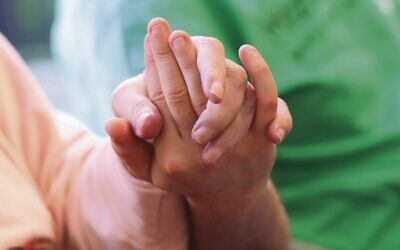 Hand in hand for Mitzvah Day. Photo: Peter Haskin