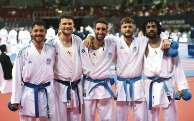 Yonatan Freund (centre) with his Australian teammates at the Karate World Championships. Photo: Kaizen Culture