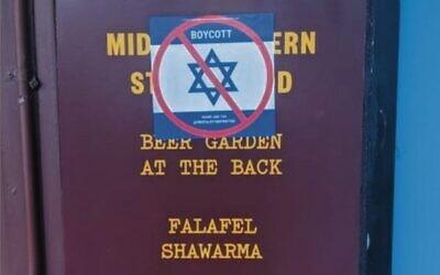 An antisemitic boycott sticker seen in Balaclava.