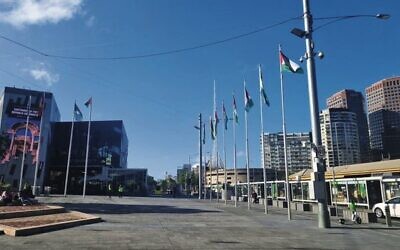 Palestinian flags flying over Melbourne's Federation Square last Friday.