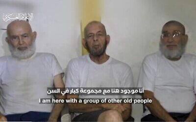 Screen capture from undated propaganda video released by the Hamas terror group on December 18, 2023 shows (L-R) Amiram Cooper, Chaim Peri, and Yoram Metzger, three Israelis held hostage since October 7 in the Gaza Strip. (The Times of Israel: X. Used in accordance with Clause 27a of the Copyright Law)