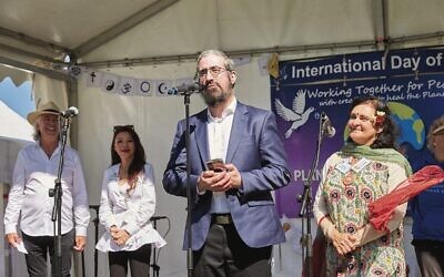 Rabbi Yaakov Glasman presenting alongside other faiths at the St Kilda Peace Festival in September. Photo: Paul Topol