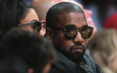 Kanye West watches an NBA game in Los Angeles in 2020.
Photo: AP Photo/Mark J. Terril