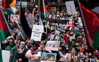 People gather during an anti-Israel rally in Sydney, Saturday, October 21, 2023. (Time of Israel: AP Photo/Rick Rycroft)