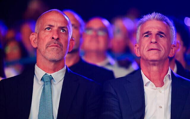 Ronen Bar, head of the Shin Bet security services, left, and Mossad chief David Barnea at the annual IDF Armored Corps memorial ceremony, marking the 50th anniversary of the Yom Kippur War, in Yad La-Shiryon, on September 27, 2023. (The Times of Israel: Jonathan Shaul/Flash90)
