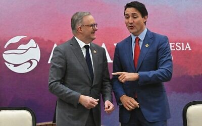Prime Ministers Anthony Albanese and Justin Trudeau share a moment at the ASEAN Summit in Indonesia in September 2023.  Photo: AAP Image/Mick Tsikas. Inset: Christopher Luxon.