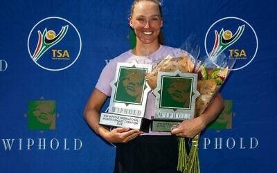 Israel's Lina Glushko proudly holding her women's singles and doubles trophies in Pretoria.
Photo: Barco Greeff/Tennis South Africa