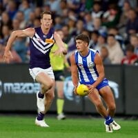 Harry Sheezel gaining possession for the Kangaroos against the Dockers last Saturday afternoon.
Photo: Dylan Burns/AFL Photos