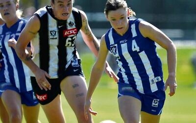Melissa Maizels (centre) playing in a VFLW trial game between the Magpies and Kangaroos.