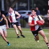 Jackas player Matt Lincoln finds space against Old Carey last Saturday at Princes Park. Photo: Peter Haskin