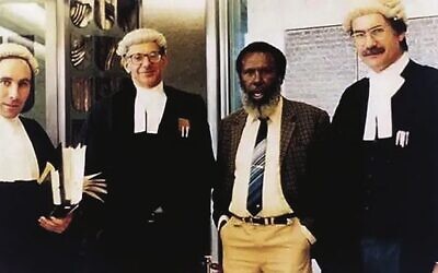 Ron Castan (second from left) and Eddie Mabo (second from right).