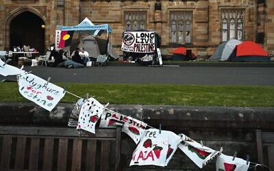 The Pro-Palestine encampment in front of the main entrance of the University of Sydney.    Photo: AAP Image/Dean Lewins 
Inset: Randa Abdel-Fattah looks on as a child leads chants on a megaphone.   Photo: screenshot