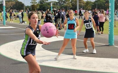 Taylor Topper keeps her eyes on the ball for the Maccabi NSW White team’s 13 division 3 side in the first round of the Randwick Netball Association 2024 season last Saturday. Photo: Shane Desiatnik