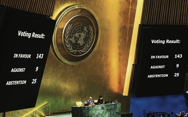 The results of the vote on screens in the UN General Assembly on May 10.
 Photo: Charly Triballeau/AFP